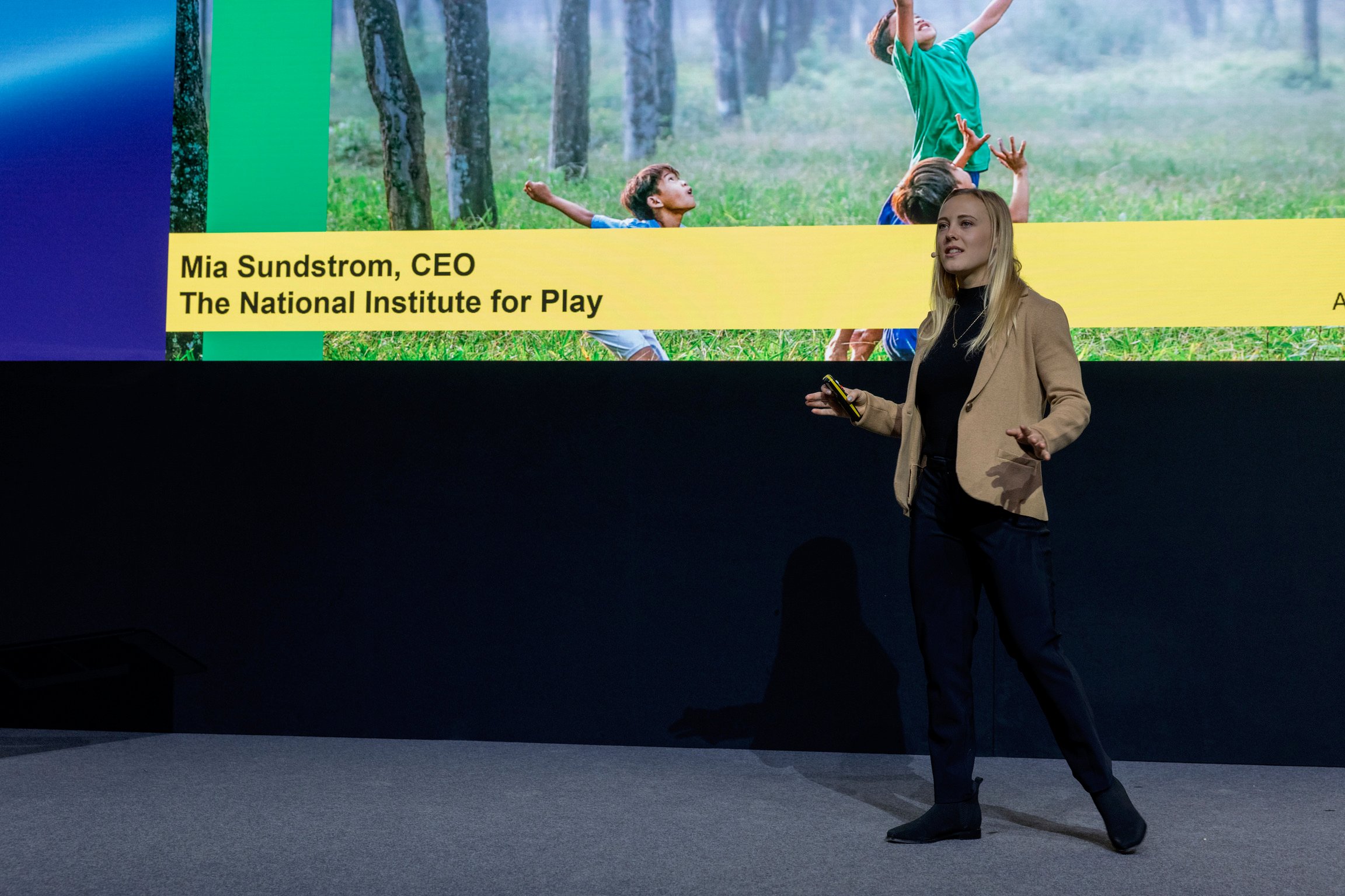 Mia Sundstrom delivering a keynote on stage